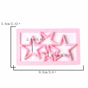Pinke Keksform aus Kunststoff in Sternform mit genauen Maßangaben in cm und Zoll