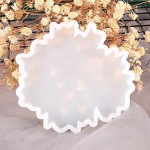 Close-up of translucent irregular jagged silicone mold for DIY creative resin coasters