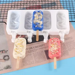 DIY 4-cavity silicone popsicle mold shown with colorful homemade geometric ice pops
