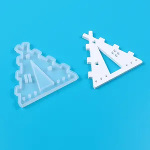Close-up detail of DIY Christmas house silicone mold with a finished white ornament