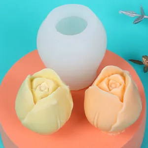 Detailed view of tulip flower silicone mold and finished wax flower models for DIY crafts