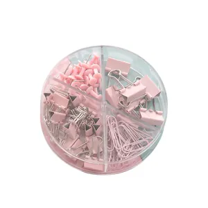 Pink office stationery set including binder clips and paper clips in a round case