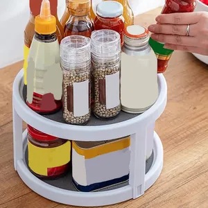 Vue détaillée d'un organiseur de cuisine blanc rotatif à deux niveaux pour épices