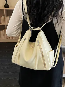 Elegant cream soft leather multi-way backpack and shoulder bag with tassel zippers