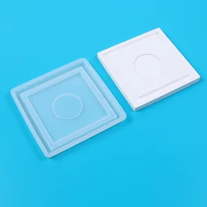 Close-up of tiered square silicone mold showing internal structure and circular center