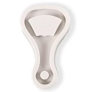 Detailed macro view of a white silicone mold for DIY resin beer bottle opener keychain