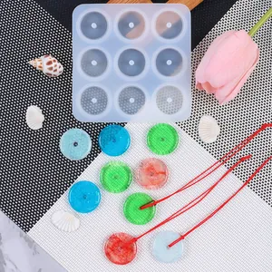 9-hole round silicone mold for DIY epoxy resin pendants and handmade jewelry charms
