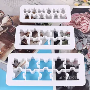 Detailed view of 3pcs white plastic geometric cookie and cake cutters set