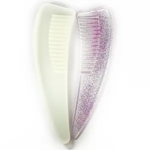 Close-up of DIY silicone comb mold and finished purple glitter resin comb.