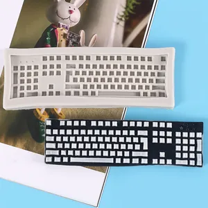 Detailed view of keyboard-shaped silicone mold for DIY resin crafts and fondant art