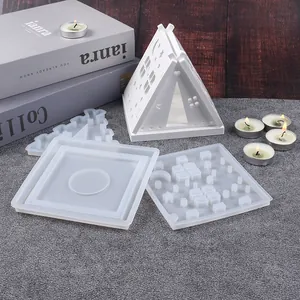 Detailed macro view of DIY house candle holder silicone mold and finished resin house