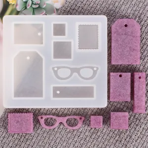 Vista dettagliata dello stampo in silicone geometrico fai-da-te e ciondoli in resina viola