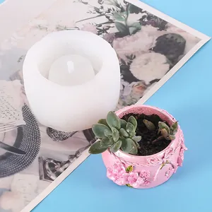 DIY succulent plant pot silicone mold with floral relief design and finished sample