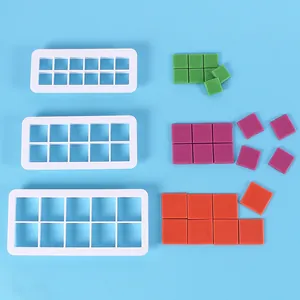 Set of 3 geometric square cookie cutters with colorful silicone inserts for baking.