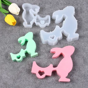 Detail of rabbit candle holder silicone mold and finished resin crafts