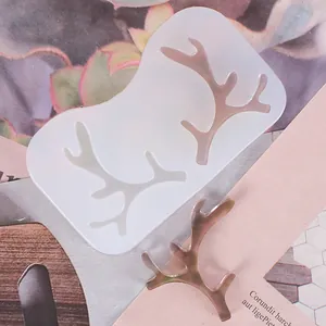 Detail of translucent silicone mold showing deer antler shape for DIY crafts