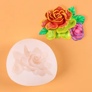 Detailed macro view of hibiscus flower silicone mold and finished colorful resin craft