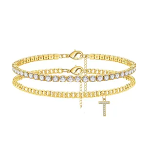 Elegant gold-tone layered anklet set featuring a CZ tennis chain and letter T charm.