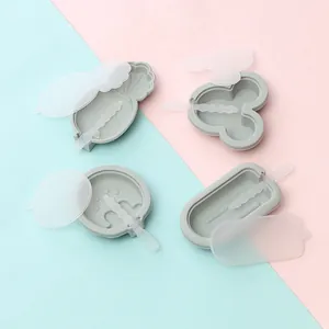 Detail view of various silicone popsicle molds with translucent lids and sticks