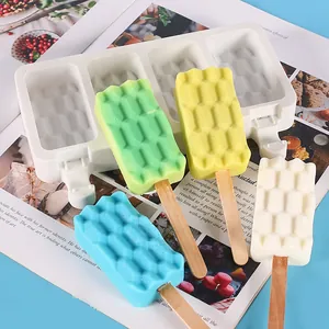 Detailed view of honeycomb silicone popsicle mold with colorful DIY ice cream treats
