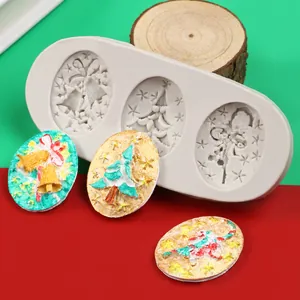 Detailed view of Christmas silicone mold for fondant cakes with tree and bell patterns