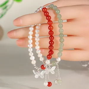 Handmade natural freshwater pearl and gemstone beaded bracelets with silver butterfly charms