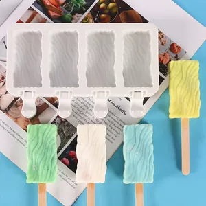 Detailed view of white 4-cavity silicone popsicle mold with colorful ice pops