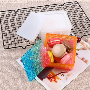 Detail view of square diamond pattern silicone mold and finished resin storage box