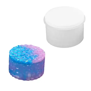 Detail view of a cylindrical silicone mold with faceted diamond texture resin box