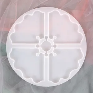 Top view of a circular irregular 4-cavity silicone mold for DIY handmade resin coasters