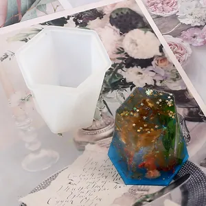 Detailed view of a hexagonal silicone mold and its finished epoxy resin craft