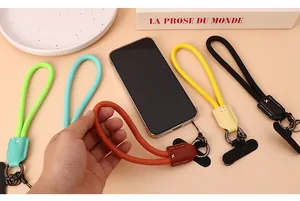 Detail of colorful nylon phone wrist straps with leather accents and durable clips