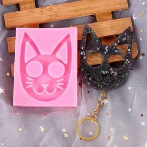 DIY cat head shaped silicone mold and finished resin keychain with glitter effect
