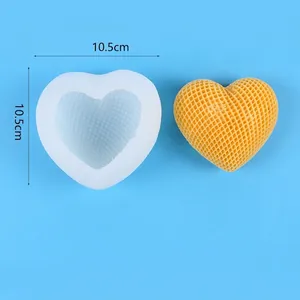 Detail view of heart shaped silicone mold with grid texture and yellow soap sample