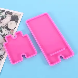 Detailed shot of two-piece pink silicone mold set for DIY crystal epoxy resin phone stand