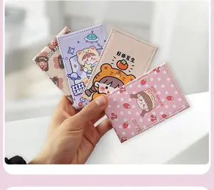 Set of four portable folding makeup mirrors featuring cute cartoon girl designs for travel