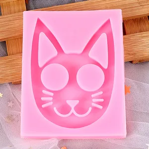 Close-up detail of a pink cat head shaped silicone mold for baking fondant and DIY crafts