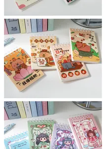 Set of A7 spiral notebooks with cute cartoon animal and girl illustrations