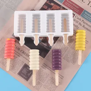 Detail view of 4-cavity silicone popsicle mold with wavy homemade ice cream pops.