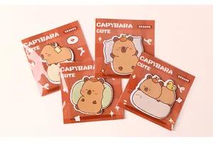 Detailweergave van vier schattige cartoon Capybara uitgesneden plaknotitiepakketten