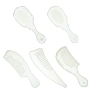 Detailed view of five vintage style silicone molds for DIY resin combs and mirrors