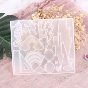 Detailed close-up of a DIY crystal epoxy silicone mold for handmade resin earrings
