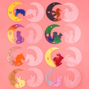 Detailed showcase of moon-shaped silicone molds with animal designs for resin DIY projects