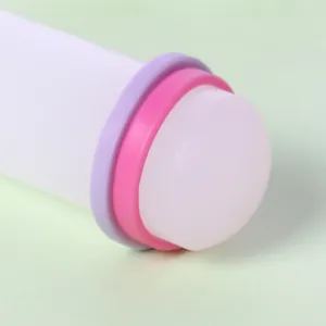 Detail view of plastic fondant embossing tool with thickness adjustment rings