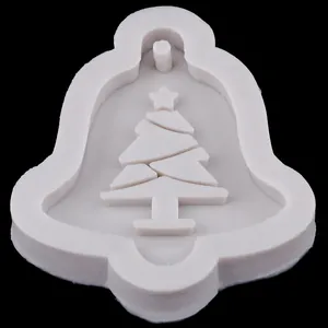 Close-up of bell-shaped silicone mold with Christmas tree detail for cake decorating