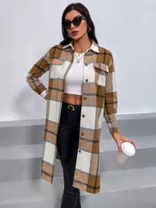 Full view of a brown and white plaid longline shirt jacket worn by a model