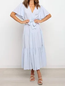Detail view of light blue V-neck Bohemian maxi dress with ruffle sleeves and belted waist