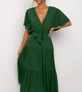 Elegant dark green bohemian style V-neck maxi dress featuring ruffled flutter sleeves