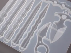 Detailed view of silicone mold for DIY resin magic wands and defense keychains