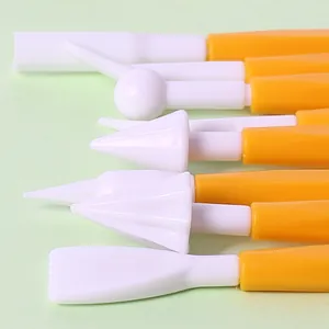 Professional set of yellow plastic fondant sculpting tools for DIY cake decorating and baking